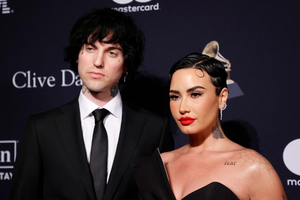 Jordan Lutes (left) and Demi Lovato are reportedly engaged after a year of dating.