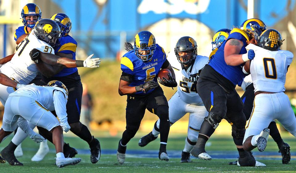 CJ Odom (5) rushes the ball for Angelo State University during a game against Texas A&M-Commerce on Saturday, Nov. 6, 2021.