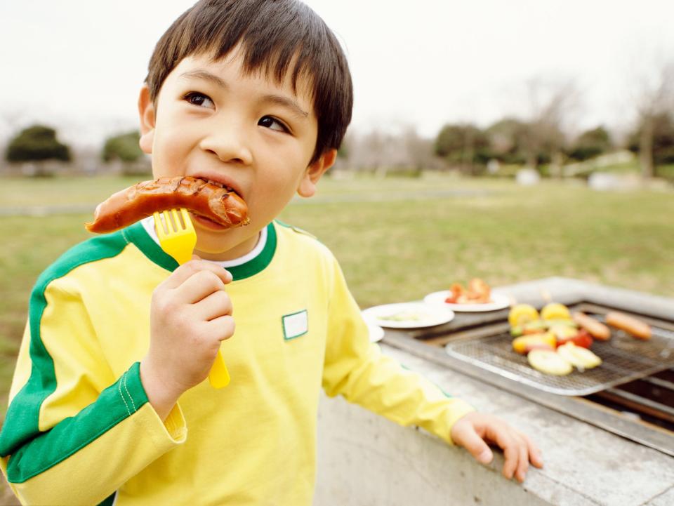 Usually around age 4, children are at less risk to choke while eating a hot dog that is not cut up.