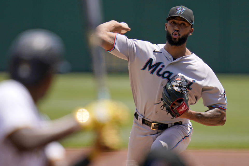 Miami Marlins starting pitcher Sandy Alcantara delivers during the second inning of a baseball game against the Pittsburgh Pirates in Pittsburgh, Sunday, June 6, 2021. (AP Photo/Gene J. Puskar)