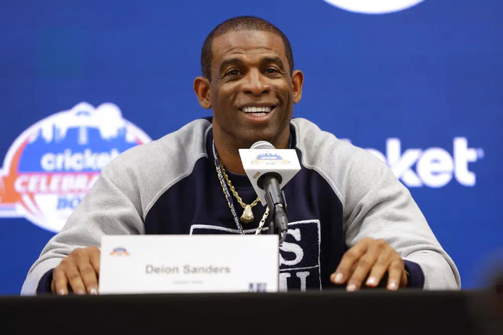 Deion Sanders speaks during a news conference for the Celebration Bowl NCAA college football game between North Carolina Central and Jackson State, Friday, Dec. 16, 2022 in Atlanta. (AP Photo/Todd Kirkland)