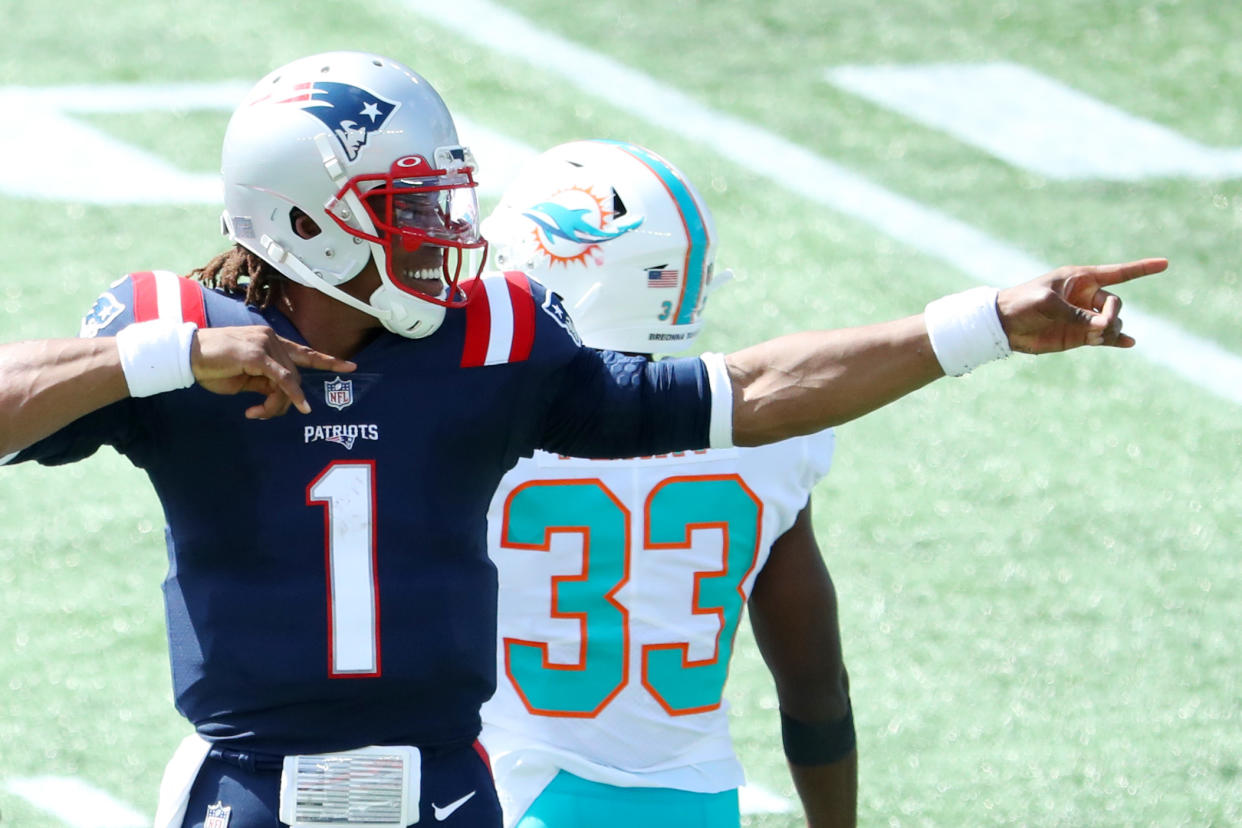 Cam Newton celebrates during the game against the Miami Dolphins.