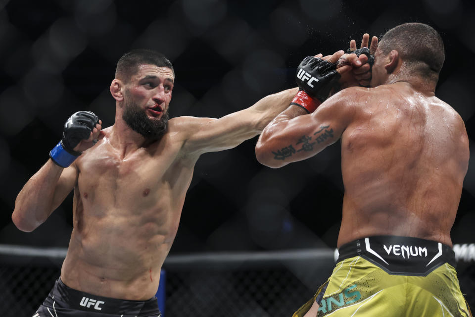 JACKSONVILLE, FLORIDA - APRIL 9: Khamzat Chimaev of Russia beats Gilbert Burns of Brazil in their welterweight bout during the UFC 273 event at VyStar Veterans Memorial Arena on April 9, 2022 in Jacksonville, Florida.  (Photo by James Gilbert/Getty Images)