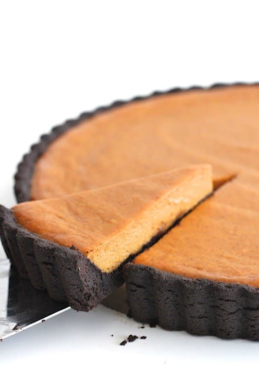 <p>The Baker Mama</p><p>The amazing combination of dark chocolate and pumpkin in this dreamy dark chocolate pumpkin tart gives traditional pumpkin pie a run for its title as fall’s favorite dessert! </p><p><strong>Get the recipe: <em><a href="https://thebakermama.com/recipes/dark-chocolate-pumpkin-tart/" rel="nofollow noopener" target="_blank" data-ylk="slk:Dark Chocolate Pumpkin Tart;elm:context_link;itc:0;sec:content-canvas" class="link rapid-noclick-resp">Dark Chocolate Pumpkin Tart</a></em></strong></p>