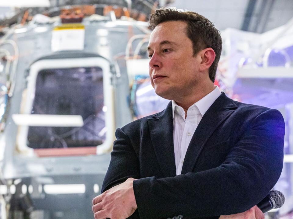 SpaceX founder Elon Musk addresses members of the media during a press conference announcing new developments of the Crew Dragon reusable spacecraft, at SpaceX headquarters in Hawthorne, California on October 10, 2019.