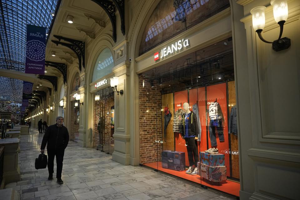 A visiter walks past a JEANS'a, a former Levi's boutique, inside the GUM Department store in Moscow, Russia, Wednesday, March 6, 2024. (AP Photo/Alexander Zemlianichenko)