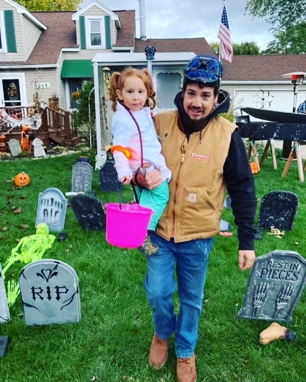 Matthew Mosher and daughter Rhyleigh go trick-or-treating on Halloween