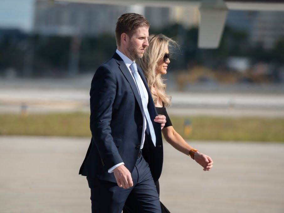 Eric and Lara Trump exit Air Force One