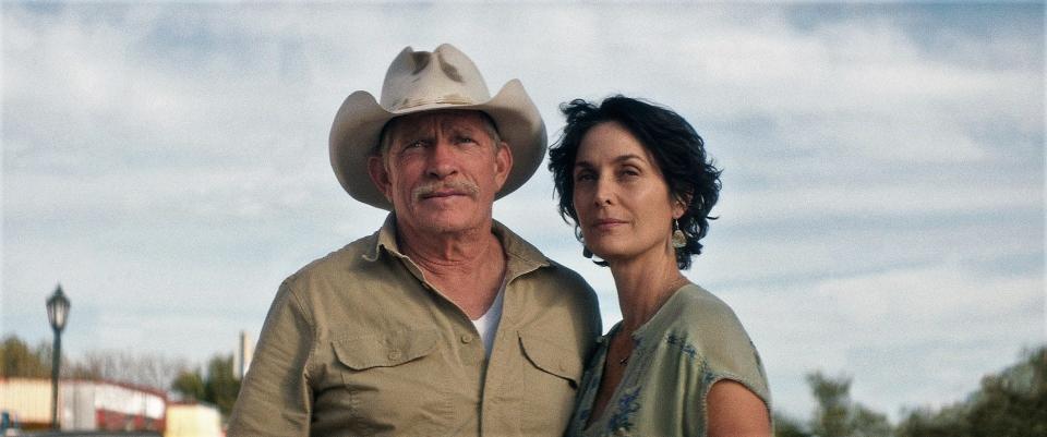 Merle (Thomas Haden Church) and Faye (Carrie-Anne Moss) in downtown Buffalo Gap in "Chocolate Lizards."