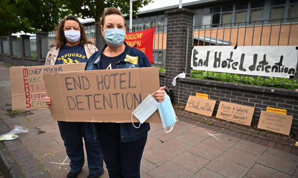 Anti-racism protesters in Glasgow call for an end to the detention of asylum seekers in hotels in July.