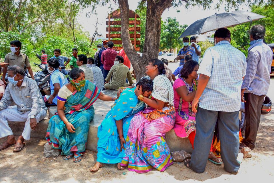 <strong>Gas leak: </strong>Family members react as they mourn deceased relatives a day after a gas leak incident at LG Polymers plant, at King George Hospital mortuary, in Visakhapatnam on May 8, 2020.Engineers battled on May 8 to prevent more toxic gas escaping at a chemical plant on India's east coast, a day after a pre-dawn leak killed 12 people and knocked locals unconscious in the street.