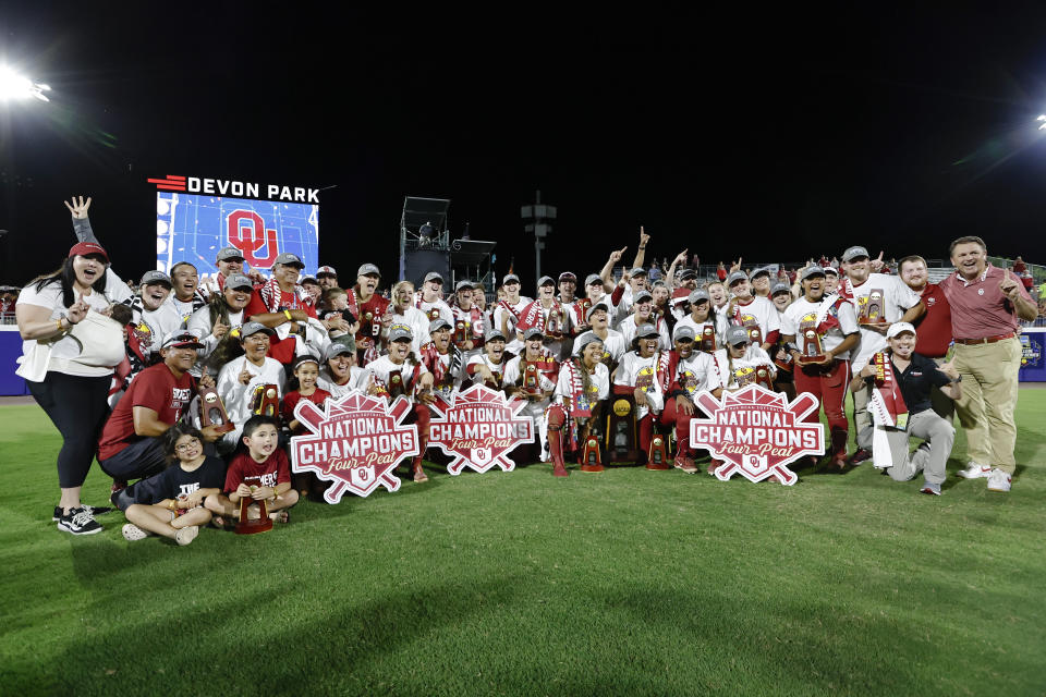 Oklahoma poses for a team photo after defeating Texas in the NCAA Women's College World Series softball championship series Thursday, June 6, 2024, in Oklahoma City. (AP Photo/Alonzo Adams)