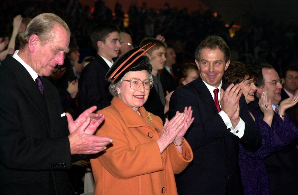 Queen's Platinum Jubilee. File photo of Queen Elizabeth II, the Duke of Edinburgh and the then Prime Minister Tony Blair at the opening ceremony of the Millennium Dome in Greenwich, London. Issue date: Thursday November 12, 2020. Speaking as MPs discussed the Queen's Platinum Jubilee celebrations, SNP culture spokesman John Nicolson told the Commons: "Politicians often have a peculiar idea about what the Queen's going to enjoy when they arrange parties for her. Who can forget her look of elation when standing in the (Millennium) Dome with Peter Mandelson one damp London Hogmanay?" See PA story ROYAL Queen.