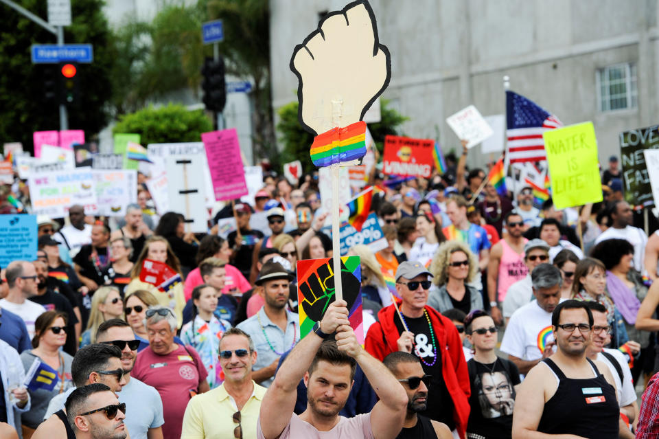 <p>People participate in a Resist March that replaced the annual Pride Parade in Los Angeles, Calif., on June 11, 2017. (Photo: Andrew Cullen/Reuters) </p>