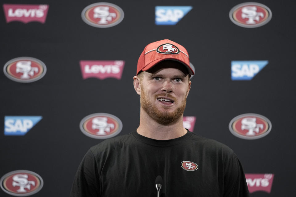 San Francisco 49ers' Sam Darnold speaks to reporters after NFL football training camp Friday, Aug. 4, 2023, in Santa Clara, Calif. (AP Photo/Godofredo A. Vásquez)