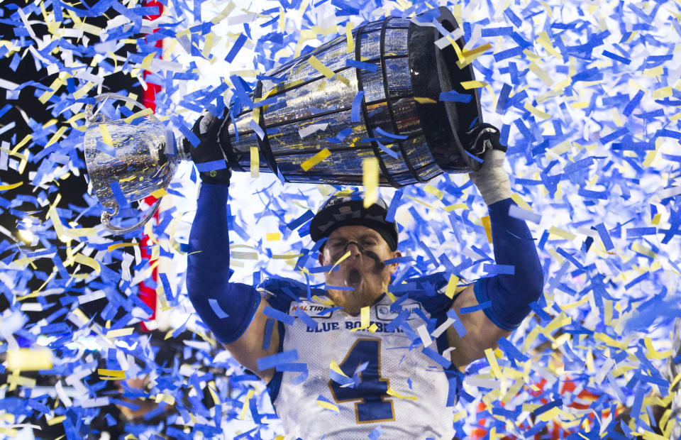 Winnipeg Blue Bombers' Adam Bighill celebrates winning the 107th Grey Cup against the Hamilton Tiger Cats in the 107th Grey Cup in Calgary, Alberta, Sunday, Nov. 24, 2019. (Todd Korol/The Canadian Press via AP)