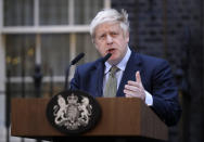 Britain's Prime Minister Boris Johnson speaks outside 10 Downing Street in London on Friday, Dec. 13, 2019. Boris Johnson's gamble on early elections paid off as voters gave the UK prime minister a commanding majority to take the country out of the European Union by the end of January, a decisive result after more than three years of stalemate over Brexit. (AP Photo/Matt Dunham)