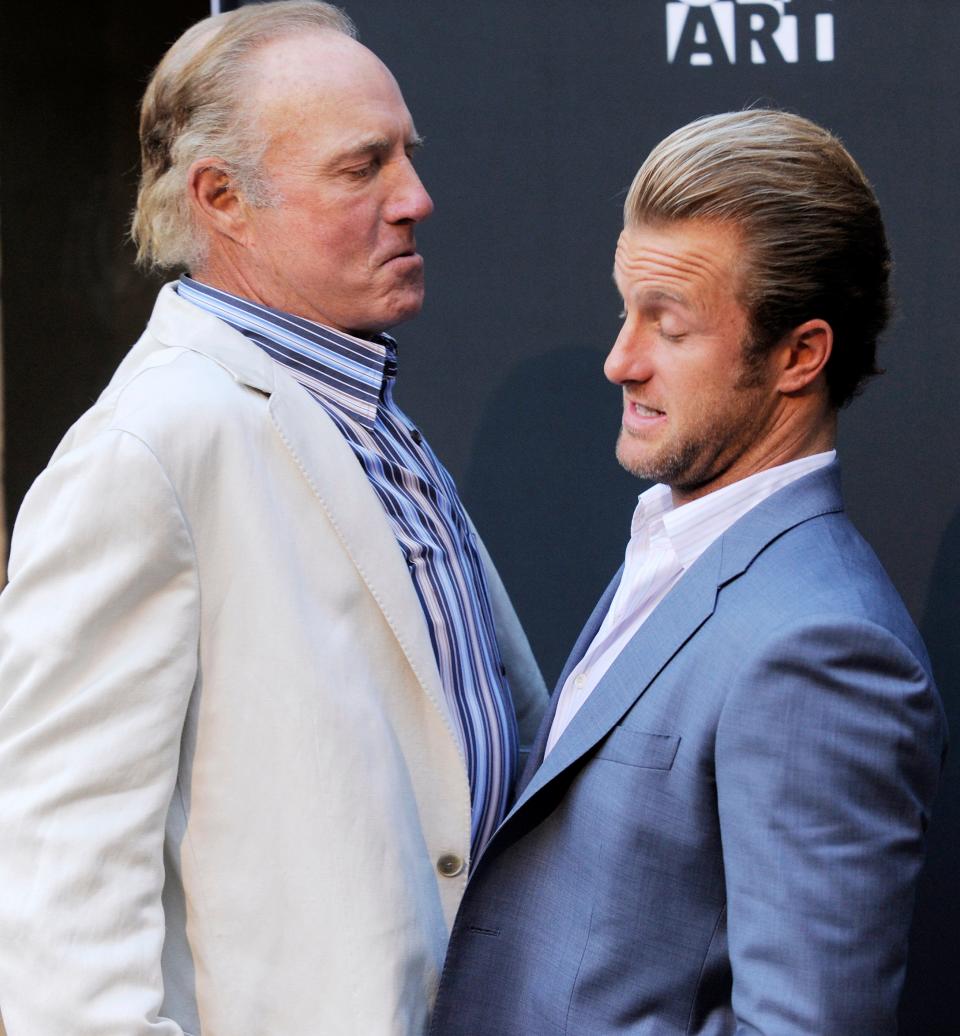 Scott Caan (right), writer/producer/star of the film "Mercy," is bumped playfully by his father, actor James Caan, at the film's premiere in Los Angeles on May 3, 2010.