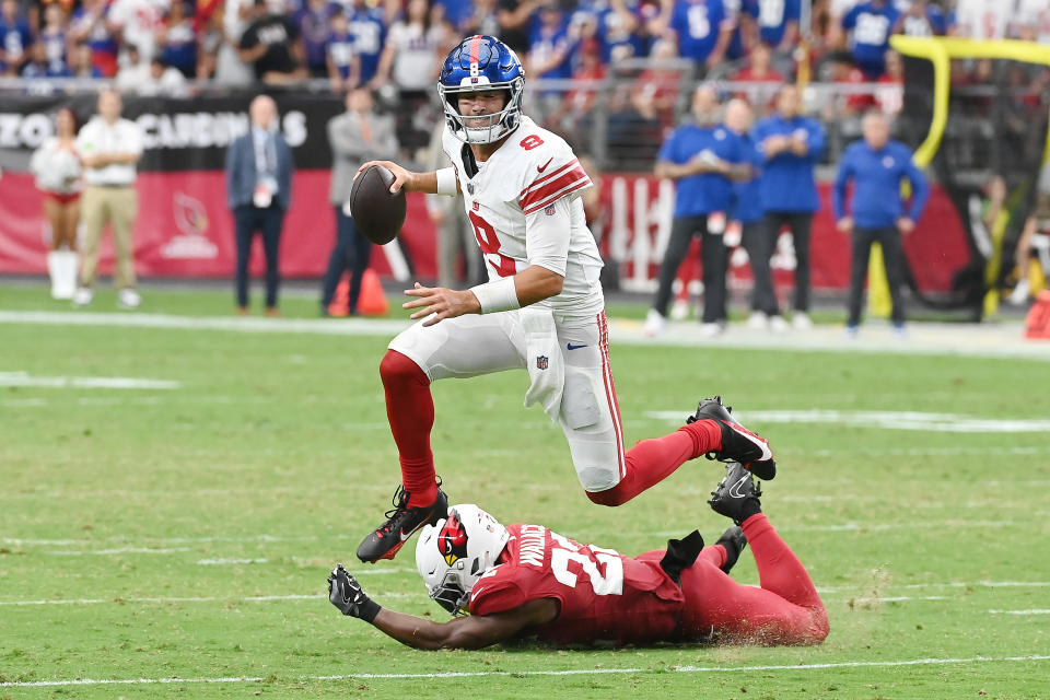 Daniel Jones (8) and the Giants are trying to pull off a miraculous comeback against the Cardinals. (Photo by Norm Hall/Getty Images)