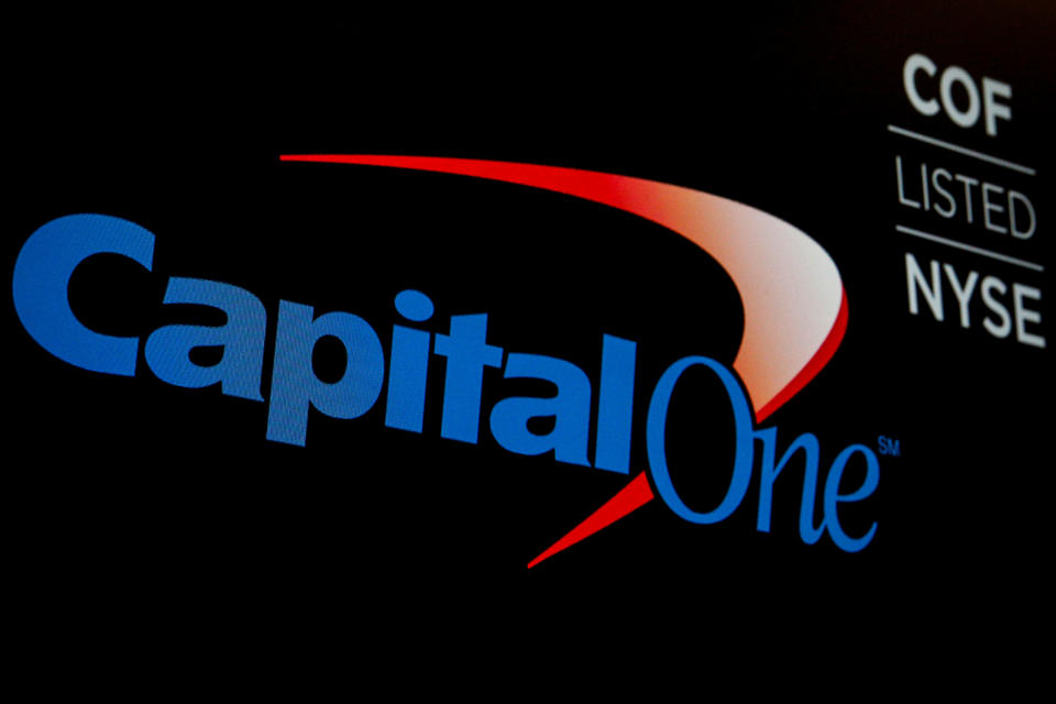 The logo and ticker for Capital One are displayed on a screen on the floor of the New York Stock Exchange (NYSE) in New York, U.S., May 21, 2018. REUTERS/Brendan McDermid