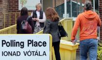 Members of the public arrive to vote at a polling station in Drumcondra, north Dublin, on May 22, 2015