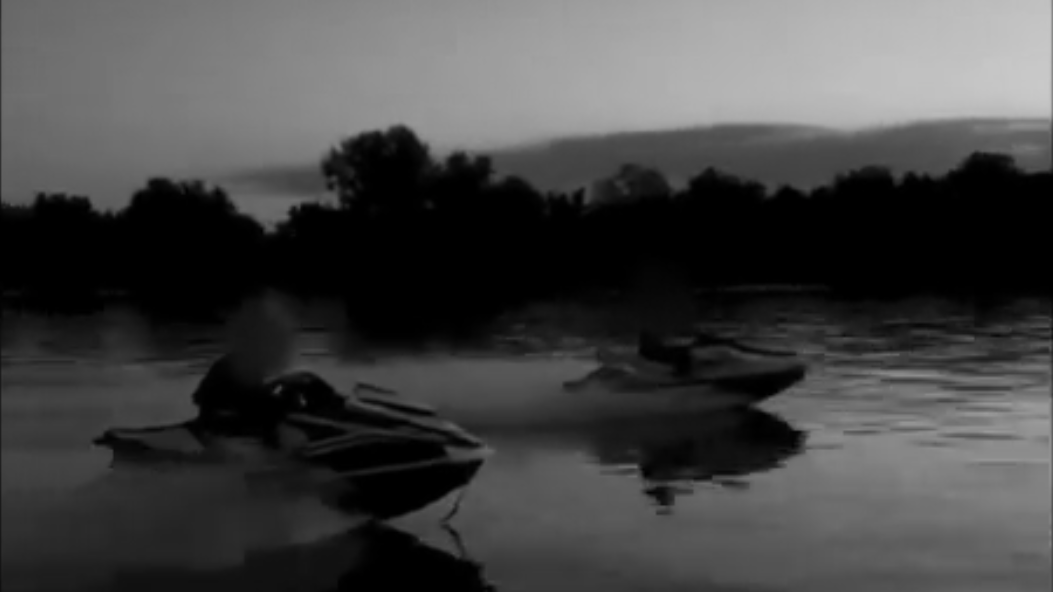 a group of boats on a lake