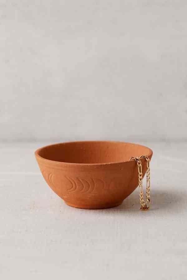 <strong><a href="https://www.urbanoutfitters.com/shop/cosmic-terracotta-catch-all-dish?category=apartment-room-decor&amp;color=086" target="_blank" rel="noopener noreferrer">Get it at Urban Outfitters</a></strong>, $6.&nbsp;