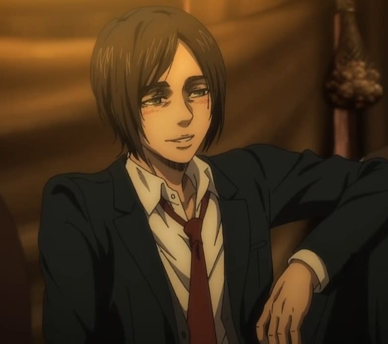 Eren smiling a little flushed in the cheeks from drinking with his friends