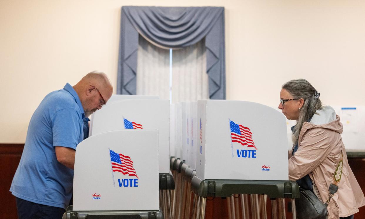 <span>Voters cast their ballots in the 2024 Maryland primary election in Chester, Maryland, on 14 May.</span><span>Photograph: Jim Watson/AFP/Getty Images</span>