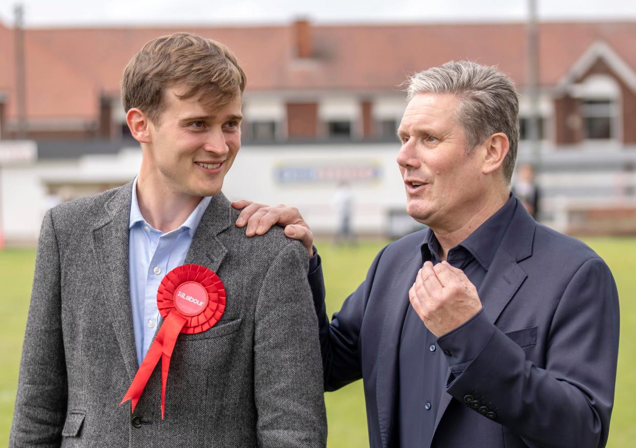 Newly elected Labour MP Keir Mather (left), with Labour leader Sir Keir Starmer at Selby football club, North Yorkshire, after winning the Selby and Ainsty by-election (PA)