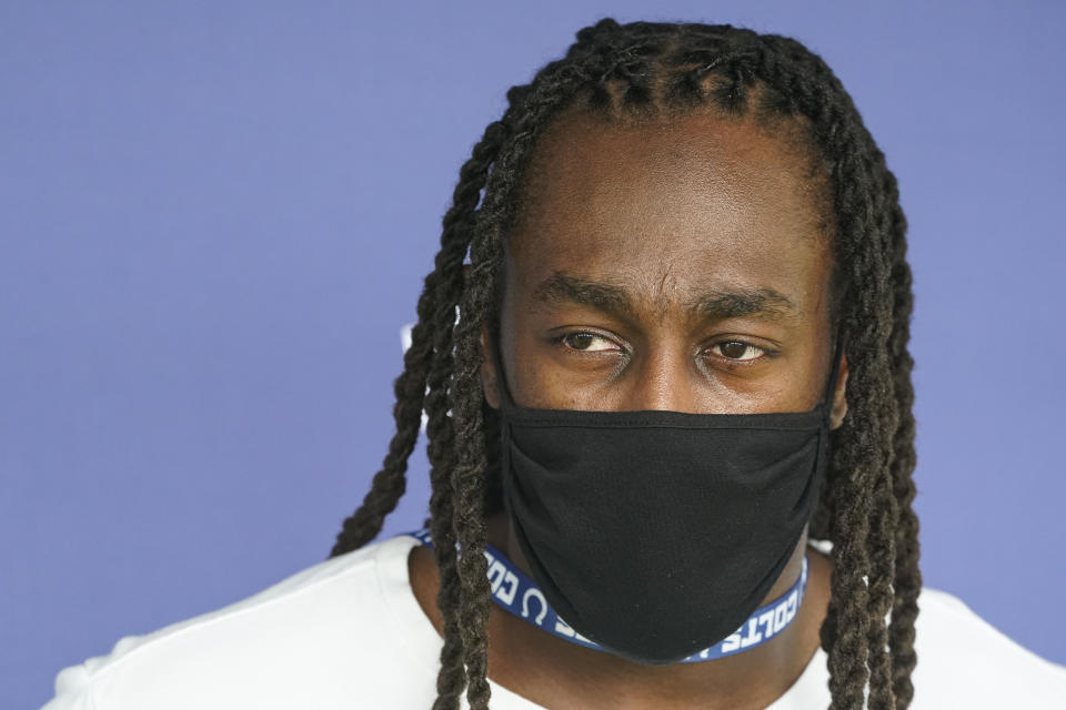 Indianapolis Colts wide receiver T.Y. Hilton speaks to the media as the players reported to the NFL team's football training camp in Westfield, Ind., Tuesday, July 27, 2021. Practice open on Wednesday. (AP Photo/Michael Conroy)