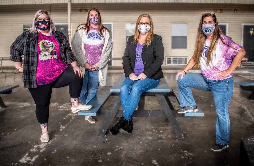 Amanda Coleman, second right, at the Harmony House shelter in Huntington (Courtesy)