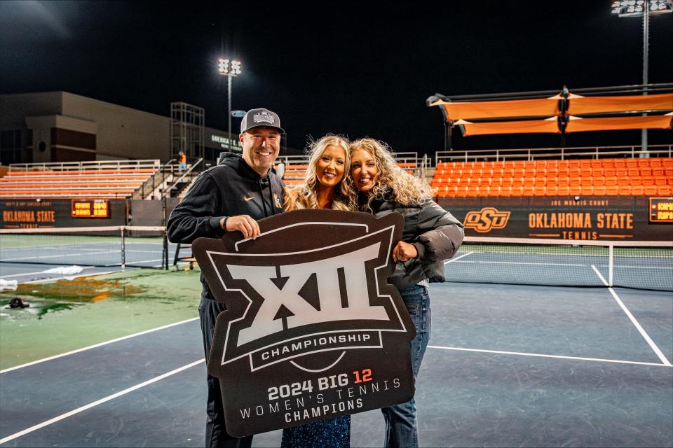 Oklahoma State tennis coach Chris Young, left, celebrates his team's Big 12 Tournament championship with his wife, Sarah, and daughter, Kelsy, before she went to prom.