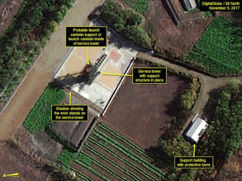 Close-up of the missile test stand indicates launch canister support or launch canister present at service tower - Credit: DigitalGlobe/ScapeWare3d