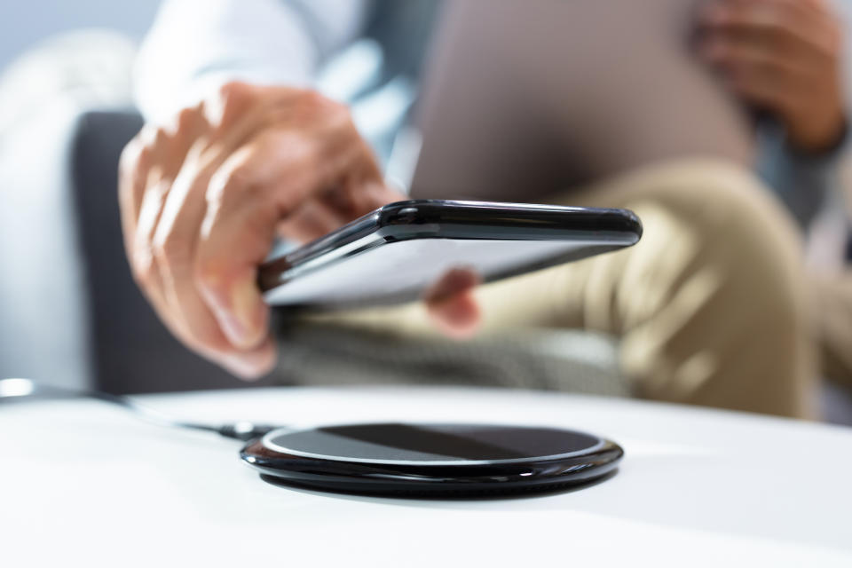 A charging pad is a convenient way to recharge your device. (Image via Getty Images)