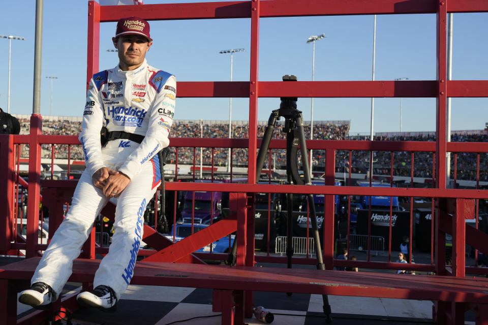 Kyle Larson waits for an interview after arriving for the NASCAR All-Star auto race at North Wilkesboro Speedway in North Wilkesboro, N.C., Sunday, May 19, 2024. (AP Photo/Chuck Burton)