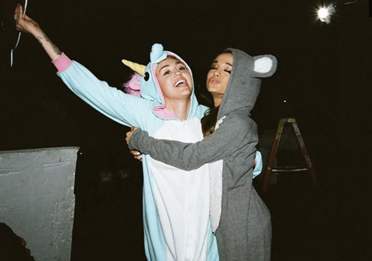 Miley Cyrus and Ariana Grande at their 2015 