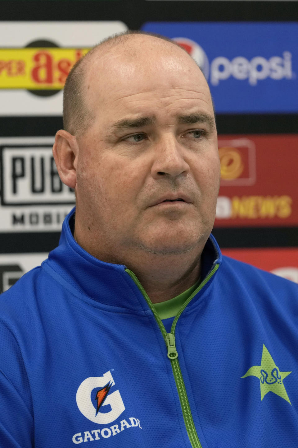 Newly appointed Pakistan cricket team's director Mickey Arthur listens to a reporter's question during a press conference, in Rawalpindi, Pakistan, Thursday, April 20, 2023. Arthur has been appointed as Pakistan cricket team's director and will be part of national team's coaching staff for this year's World Cup. (AP Photo/Anjum Naveed)