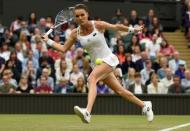 Britain Tennis - Wimbledon - All England Lawn Tennis & Croquet Club, Wimbledon, England - 29/6/16 Poland's Agnieszka Radwanska in action against Ukraine's Kateryna Kozlova REUTERS/Tony O'Brien