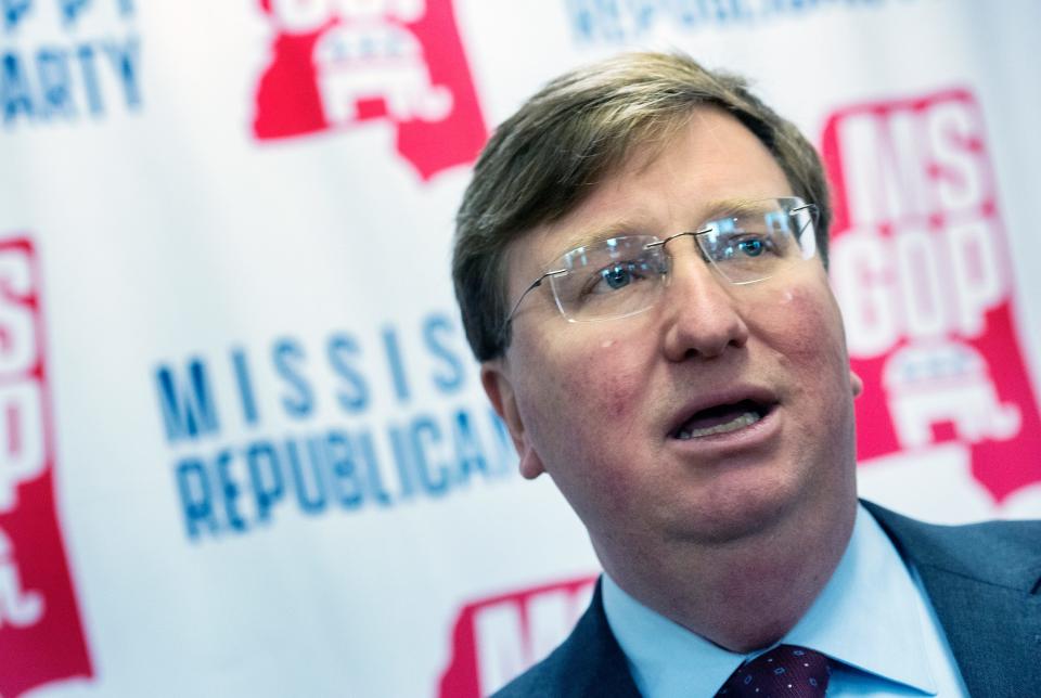 Gov. Tate Reeves signs the Republican Candidate Party Nomination form to officially state his intent and qualification to run for a second term as governor at the Mississippi Republican Headquarters in Jackson, Miss., Tuesday, Jan. 3, 2023.