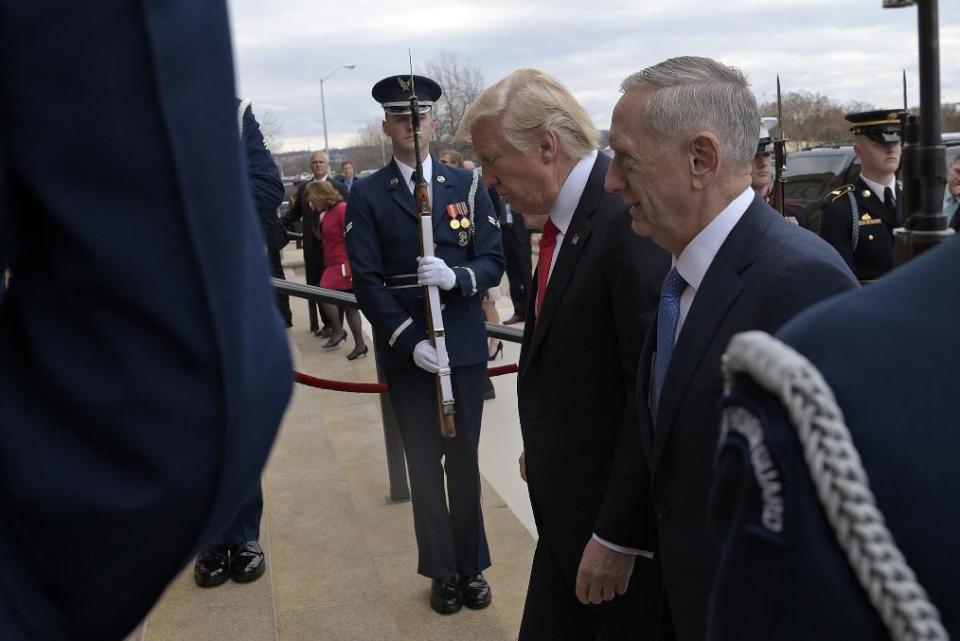 President Donald Trump and Defense Secretary James Mattis walk into the Pentagon, Friday, Jan. 27, 2017. (AP Photo/Susan Walsh)