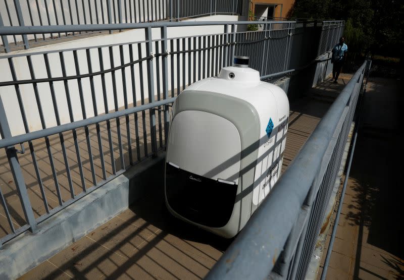 Carmello, an autonomous grocery delivery robot, makes its way during a delivery in Singapore