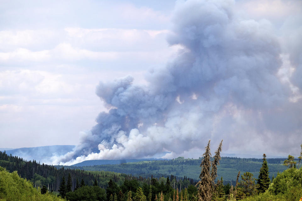 FILE - Smoke billows from the Donnie Creek wildfire burning north of Fort St. John, British Columbia, Canada, Sunday, July 2, 2023. (AP Photo/Noah Berger, File)