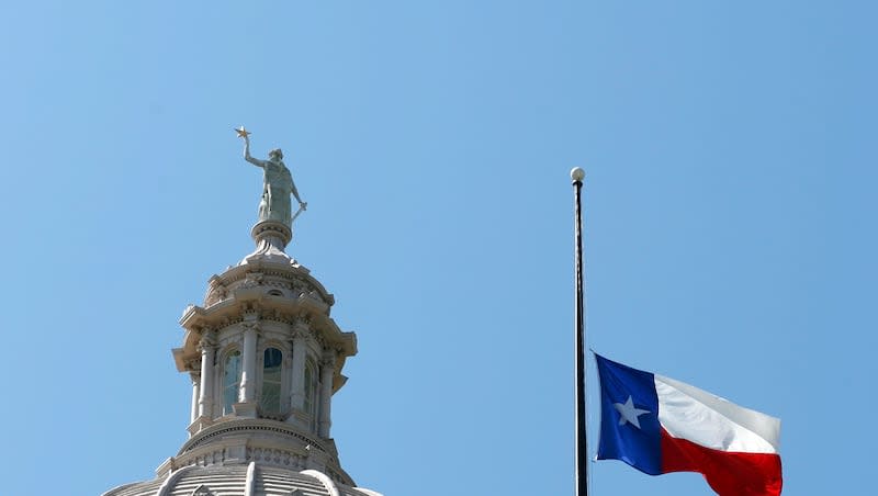 The Texas flag flies at half-staff on the Capitol, Sept. 14, 2006, in Austin, Texas.