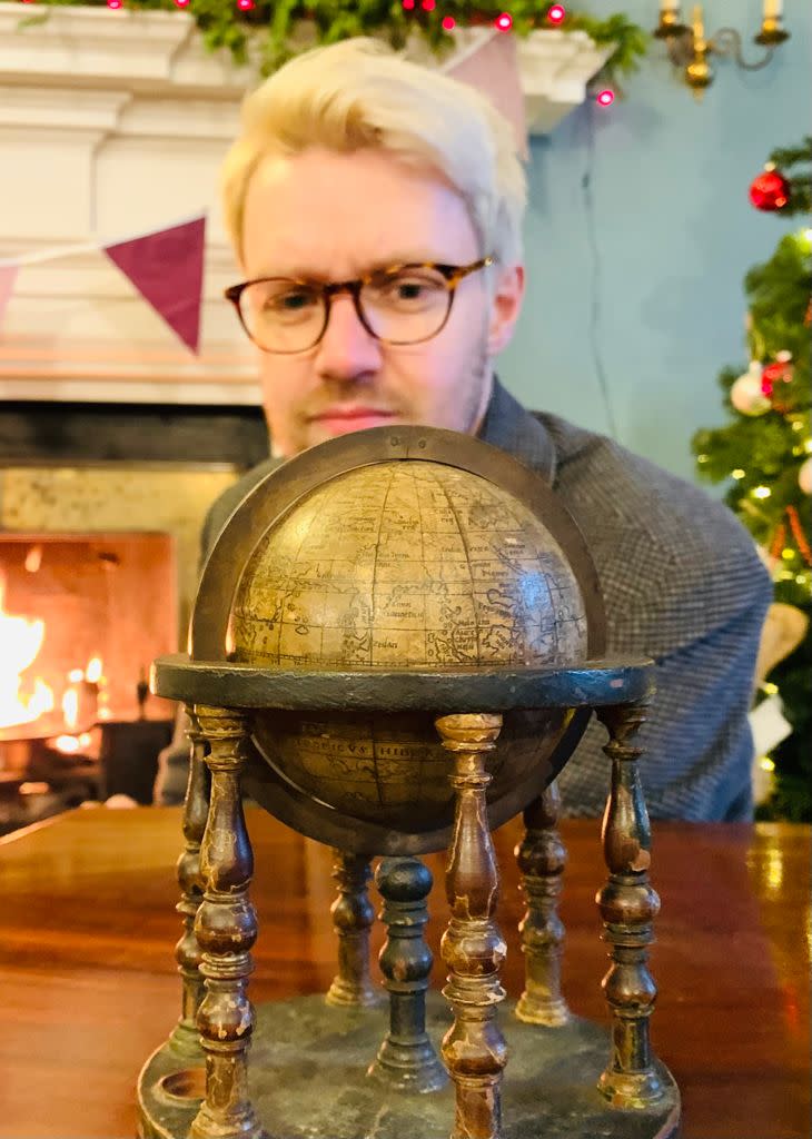 Jim Spencer with the globe