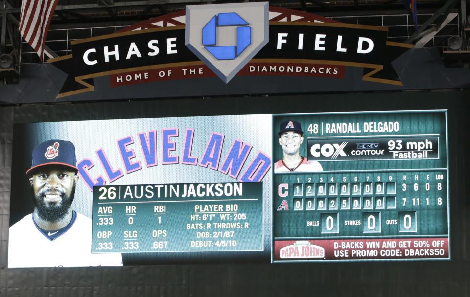 The scoreboard displays a speed, upper right, on pitch by Arizona Diamondbacks' Randall Delgado to Cleveland Indians' Austin Jackson during the ninth inning of a baseball game Friday, April 7, 2017, in Phoenix. From watching broadcasts and scoreboards, fans are seeing velocities ramp up around the majors this year. Check the leaderboards at analytics website Fangraphs, and you’ll see that last April, pitchers averaged 92.2 mph on four-seam fastballs. Through Thursday’s games this season, they’re up to 93.1 mph, an unprecedented jump. Did some 300 pitchers all find ways to boost their speed in the offseason? Not quite. More likely, the perceived speed spike is coming from a change in how pitches are being recorded and reported. (AP Photo/Rick Scuteri)