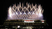 <p>Fireworks illuminate over the National Stadium during the opening ceremony of the 2020 Summer Olympics, Friday, July 23, 2021, in Tokyo. (AP Photo/Shuji Kajiyama)</p> 