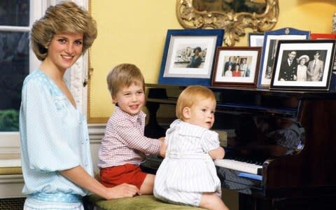 Diana, Princess of Wales with her sons, Prince William and P Original description: UNITED KINGDOM - OCTOBER 04: Diana, Princess of Wales with her sons, Prince William and Prince Harry, at the piano in Kensington Palace (Photo by Tim Graham/Getty Images) - Credit: Getty