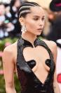 <p>You can totally do cornrows on short hair, as seen here on Zoe Kravitz. Taylor recommends having about two inches of hair length in order to style your hair into cornrows, otherwise she says the hair won't be long enough to braid. </p>