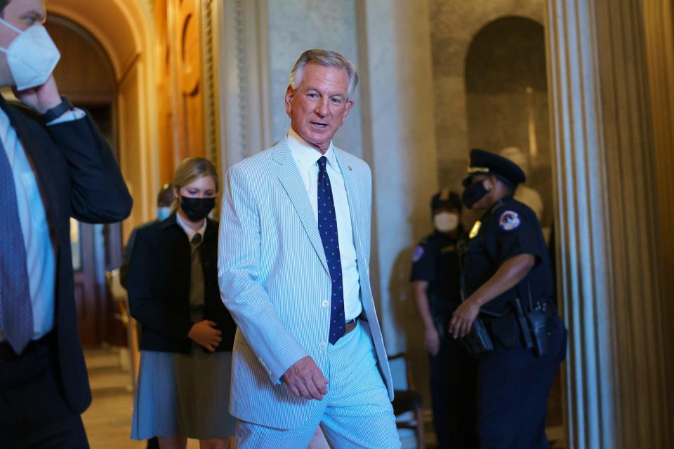 Sen. Tommy Tuberville, R-Ala., departs the Senate as lawmakers work on Aug. 2, 2021.